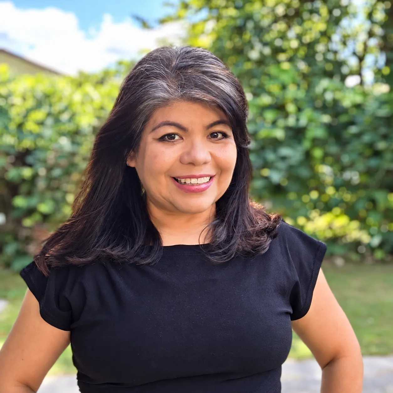 Portrait of Erika Rubio smiling outdoors